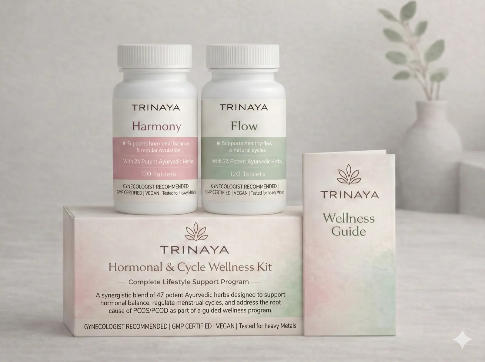 Trinaya Wellness PCOS Kit - Hormonal & Cycle Wellness Kit with Harmony and Flow supplement bottles in elegant gift box with botanical elements